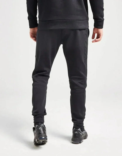 UA Pantalon de jogging Essential Utility Homme